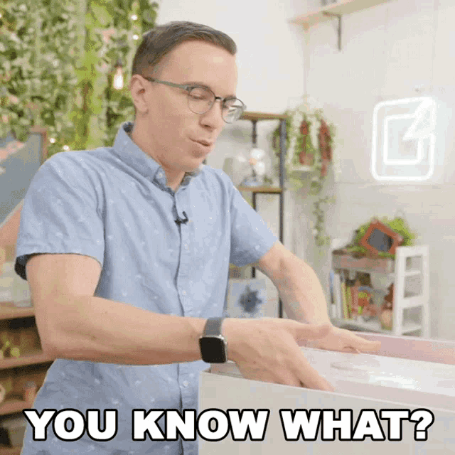 a man wearing glasses and a watch says " you know what "