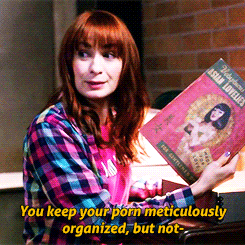 a woman holding a book that says asian lovelies on it