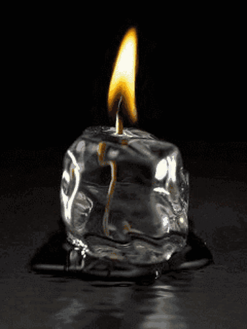 a lit ice cube with a flame on top of it