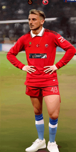 a man in a red jersey with the number 48 on it