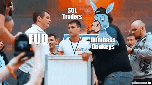 a group of men are standing around a white board with the words fud and dumbass donkeys written on it