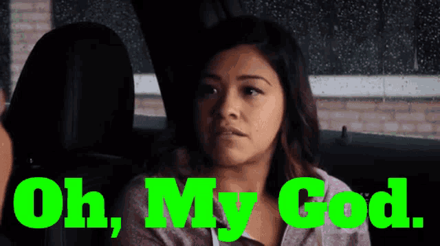 a woman is sitting in the back seat of a car with the words oh my god in green letters