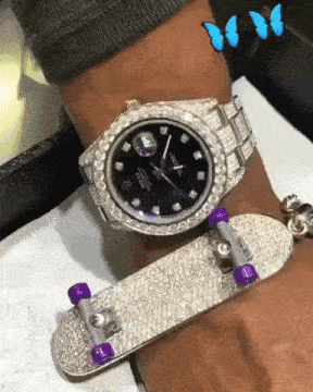 a person is wearing a rolex watch and a skateboard