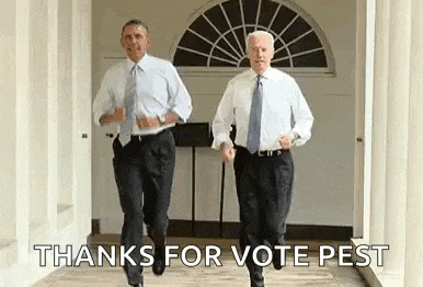 obama and biden are running down a hallway together .