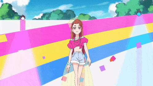 a girl in a pink top and shorts is standing in front of a rainbow
