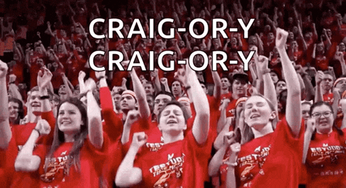 a crowd of people wearing red shirts with the name craig-or-y written above them