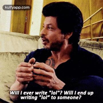 a man is sitting on a couch talking to someone and says " will i ever write " lol "