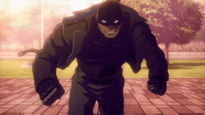 a cartoon character with a mask and gloves is standing on a brick sidewalk