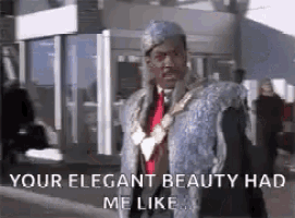 a man in a fur coat and tie is walking down the street and says `` your elegant beauty had me like '' .