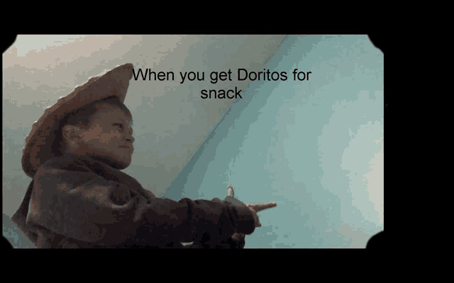 a boy wearing a cowboy hat is pointing at something with the words " when you get doritos for snack " on the bottom