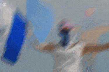 a woman with a mask on her face is holding two flags with the year abril 2018 written on the bottom
