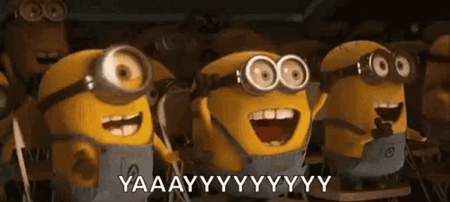 a group of minions are standing next to each other in a classroom and laughing .