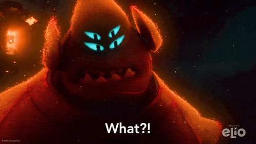a red monster with glowing eyes and the words what written below it