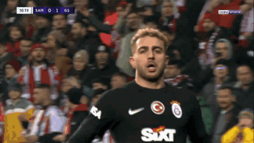 a soccer player wearing a shirt that says sixt