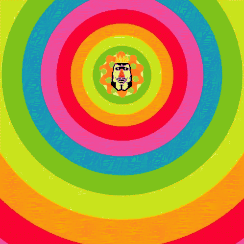 a rainbow colored circle with a face in the middle