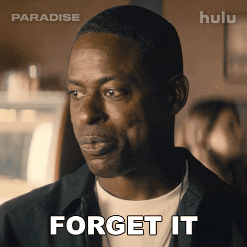 a man in a black shirt says forget it