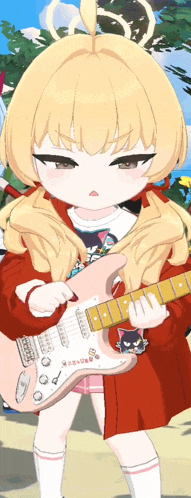 a girl with blonde hair is holding a guitar with a cat on it