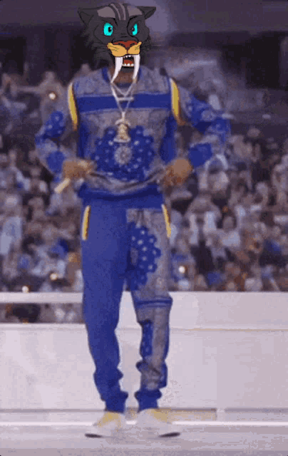a man with a cat mask on his face is dancing