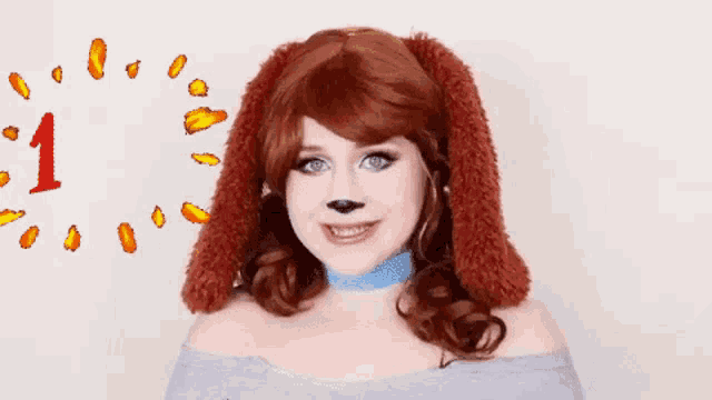 a woman in a dog costume is smiling with a 100 % sign in the background