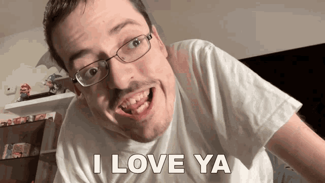 a man with glasses says i love ya