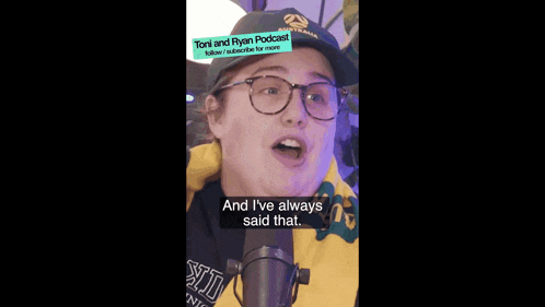 a woman wearing glasses and a hat says " and i 've always said that " while talking into a microphone