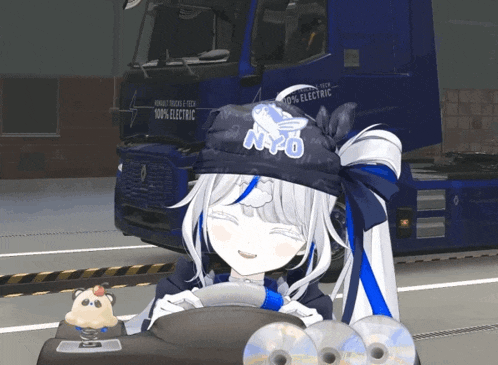 a girl wearing a hat that says npo is sitting in front of a renault truck