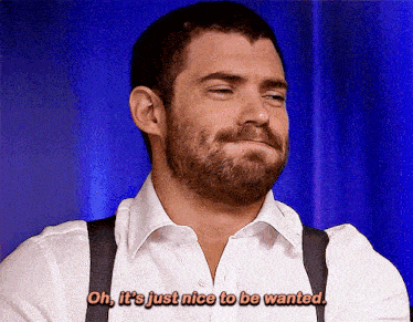 a man in a white shirt and suspenders says oh it 's just nice to be wanted