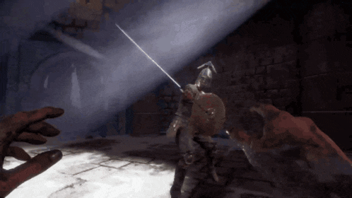 a person holding a sword and shield in a dark room