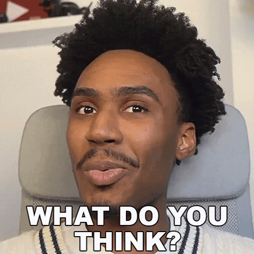 a man with curly hair is making a funny face and says what do you think