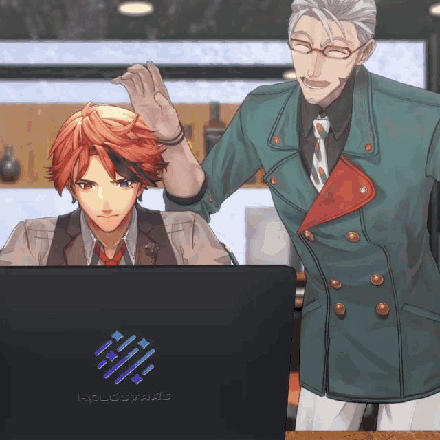 a man in a green jacket stands next to another man in front of a laptop that says holostar