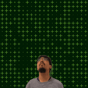 a man stands in front of a green background with the number 21