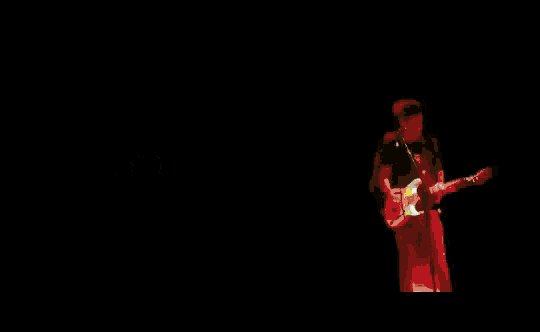 a man playing a guitar and singing into a microphone with the words chief chief chief chief chief chief