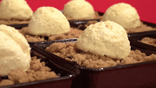 ice cream scoops are sitting on top of a dessert