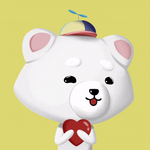 a cartoon bear with a hat on his head holds a heart