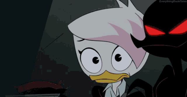 a cartoon of a duck standing next to a spider with the words everythingducktales on the bottom right