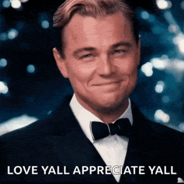 a man in a suit and bow tie is smiling with the words love yall appreciate yall written below him