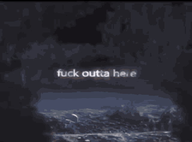 a woman is smiling with the words fuck outta here behind her