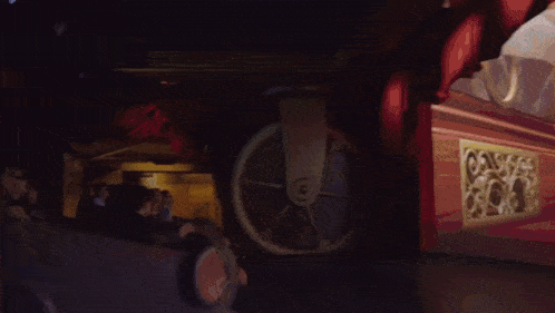 a blurred image of a person 's face with a red background