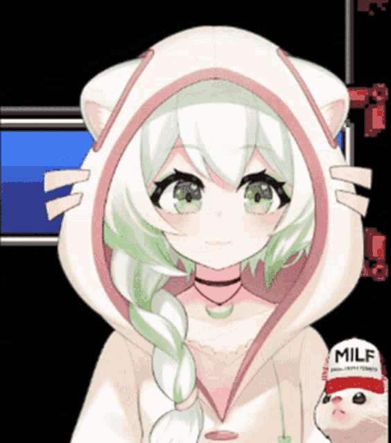 a girl in a cat hoodie is holding a cat wearing a milk hat