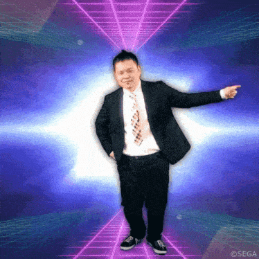 a man in a suit and tie is dancing and pointing at something