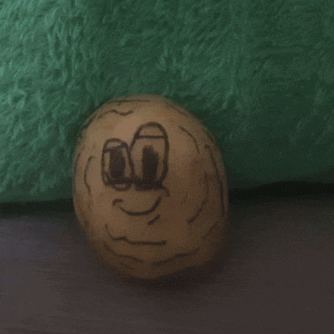 a peanut with the word pea on it