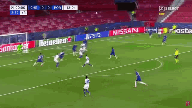 a soccer game is being played in front of a pepsi sign