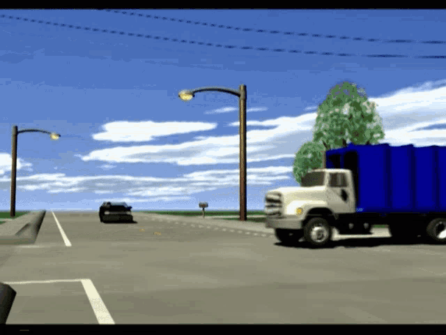 a blue garbage truck is driving down a city street