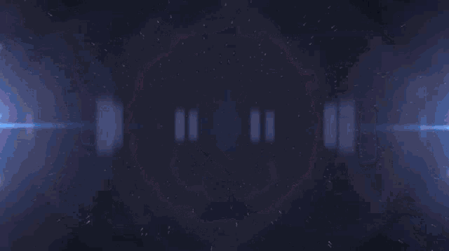 a purple and blue circle in the middle of a dark blue background
