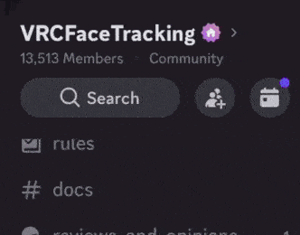 a close up of a purple cartoon character 's face with the words `` vrc face tracking '' below it .