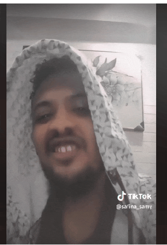 a man with a hood on his head has a tiktok account named safina_samy
