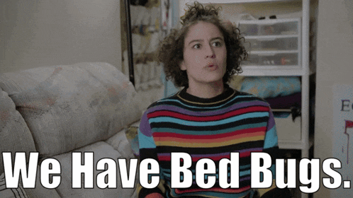 a woman is sitting on a couch with the words we have bed bugs