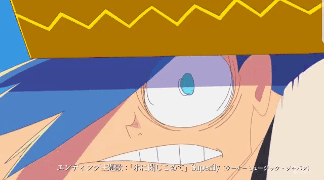 a close up of a cartoon character 's face with japanese writing