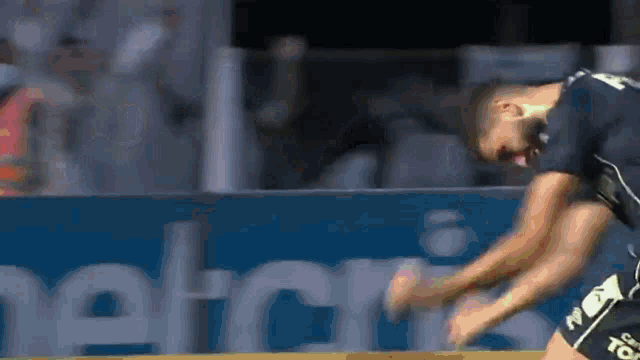 a soccer player wearing a jersey that says ' n ' on it