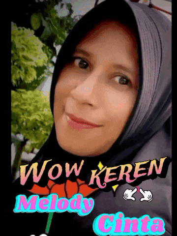 a woman wearing a black hijab with the words wow keren melody cinta